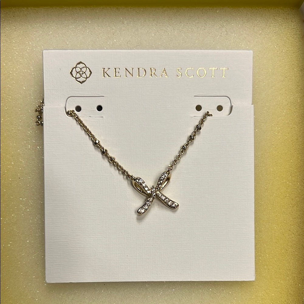 Kendra Scott Gold and Silver Necklace with Cross Pendant